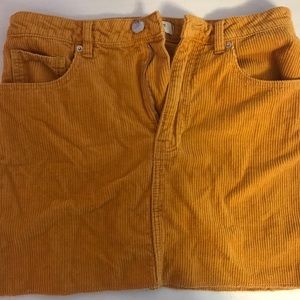 High waisted dark yellow-orange skirt